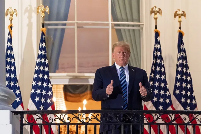 Framed Print : President Donald Trump gestures thumbs up to supporters after his discharge from Walter Reed hospital on Oct. 5, 2020