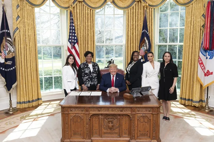 Framed Print : President Donald Trump, joined by Kim Kardashian West (in white suit), meet with sentencing commutation recipients Framed Print : President Donald Trump, joined by Kim Kardashian West (in white suit), meet with sentencing commutation recipients