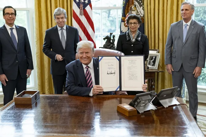 Framed Print : President Donald Trump after signing the Paycheck Protection Program and Health Care Enhancement Act Friday, April 24, 2020. Standing, L-R: Treasury Secretary Steven Mnuchin; Sen