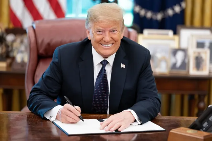 Framed Print : President Donald Trump smiles into the camera as he signs a memorandum supporting the US Lobster Industry, June 24, 2020