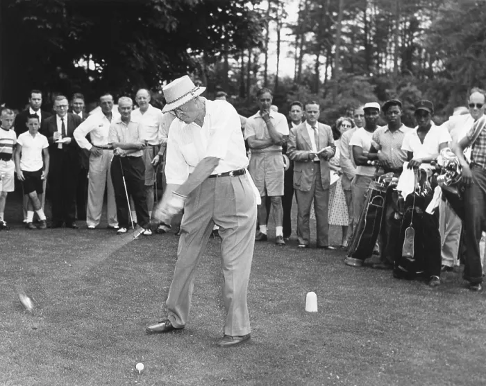 Framed Print : President Dwight Eisenhower teeing off. His audience includes African American caddies. August 1957. - (BSLOC_2014_16_99) Framed Print : President Dwight Eisenhower teeing off. His audience includes African American caddies. August 1957. - (BSLOC_2014_16_99)