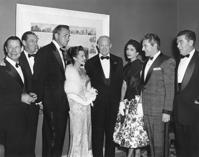 Framed Print : President Eisenhower with celebrities at the White House Photographers Dinner at the Statler Hotel. March 19, 1955. L-R: Joe E