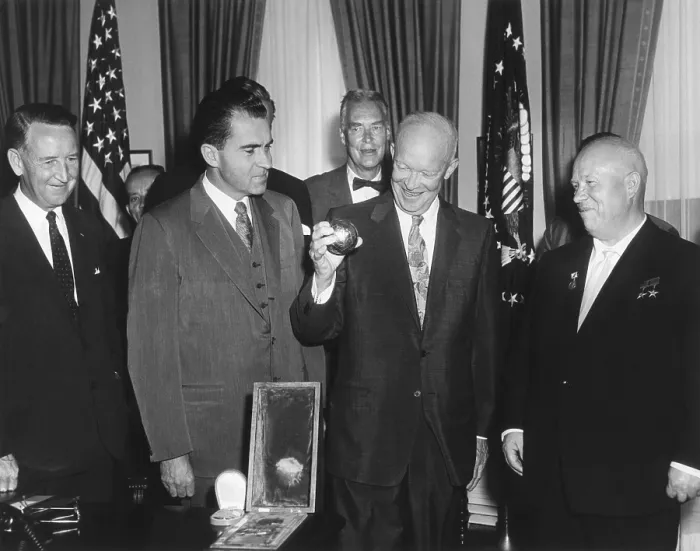 Framed Print : President Eisenhower holding a gift from Soviet Premier Nikita Khrushchev. It was a replica of metal ball, 7.5 cm in diameter, launched to the lunar surface in Luna 2 Framed Print : President Eisenhower holding a gift from Soviet Premier Nikita Khrushchev. It was a replica of metal ball, 7.5 cm in diameter, launched to the lunar surface in Luna 2