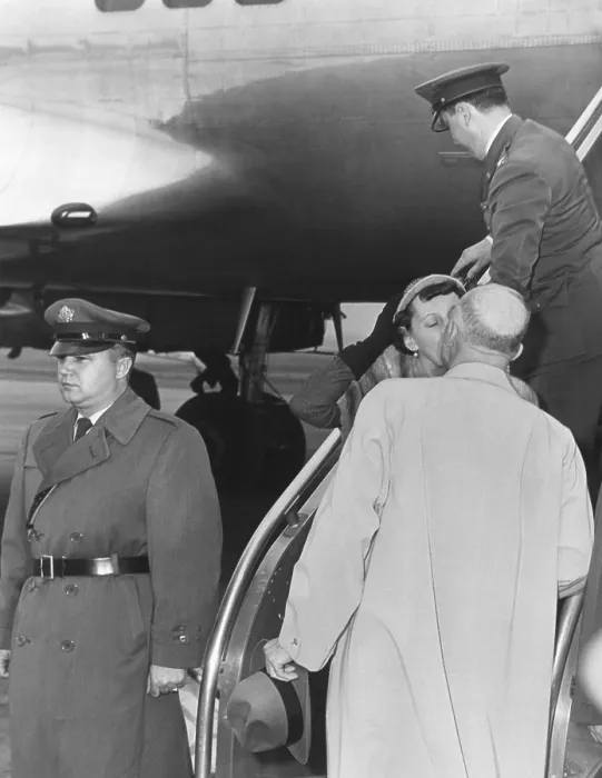 Framed Print : President Eisenhower kisses First Lady Mamie upon her return from Phoenix, Arizona. March 11, 1958. - (BSLOC_2014_16_88)