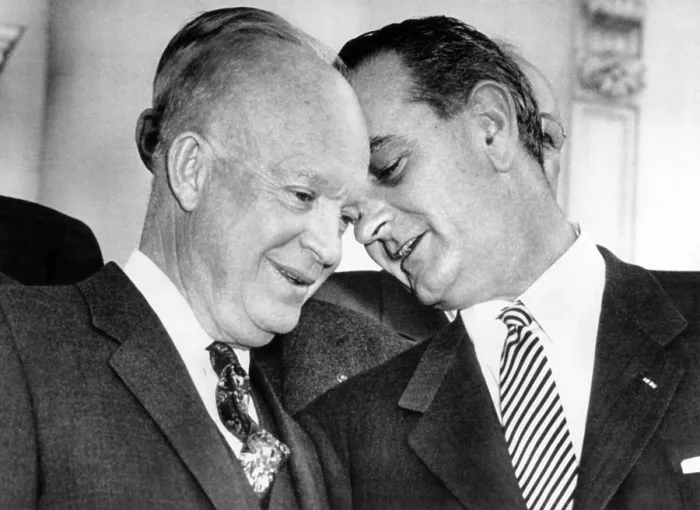 Framed Print : President Eisenhower lends an ear to Senate Majority Leader, Lyndon Johnson, following a bipartisan luncheon of Senate leaders at the White House. March 31, 1955