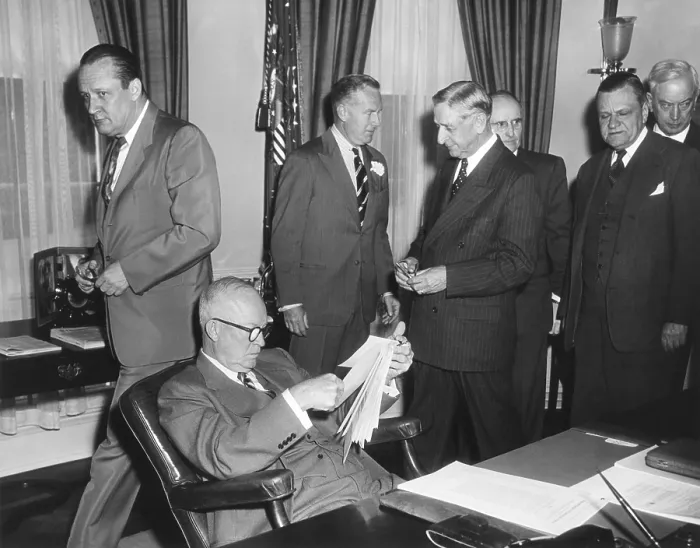 Framed Print : President Eisenhower reads the Highway Act of 1954 before signing. May 6, 1954