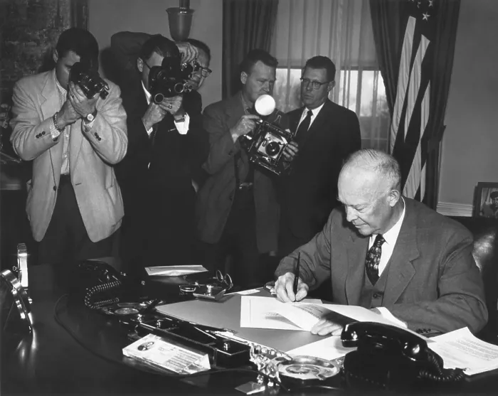 Framed Print : President Eisenhower signing a Resolution to Promote Peace and Stability in the Middle East