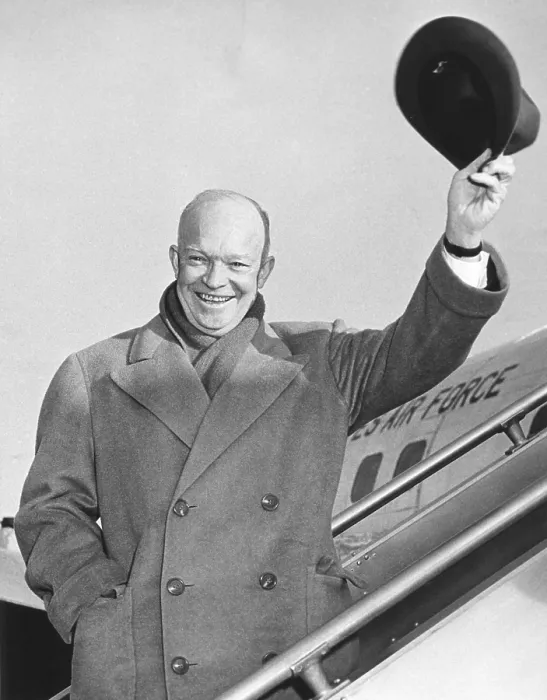 Framed Print : President Eisenhower waving his hat from airplane steps Framed Print : President Eisenhower waving his hat from airplane steps
