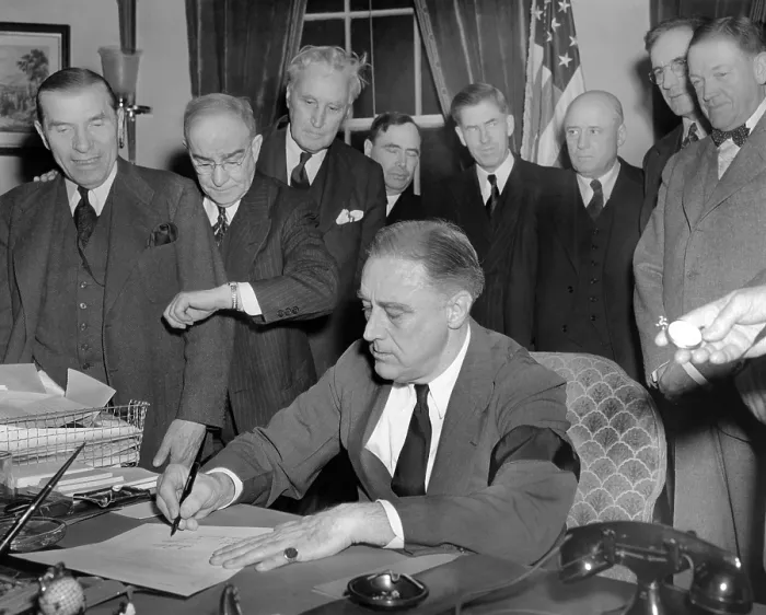 Framed Print : President Franklin D. Roosevelt signs the joint congressional resolution declaring war with Japan at 4:10 PM, Dec. 8, 1941. Standing L-R: Rep Framed Print : President Franklin D. Roosevelt signs the joint congressional resolution declaring war with Japan at 4:10 PM, Dec. 8, 1941. Standing L-R: Rep