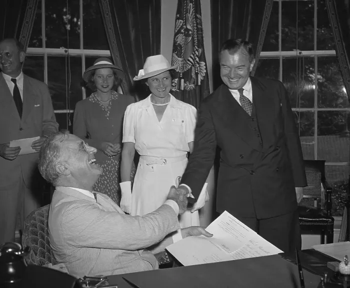 Framed Print : President Franklin Roosevelt congratulates newly sworn in Justice Robert Jackson. July 11, 1941. L-R: Henry Hopkins (cropped); FDR; Mary Jackson, daughter of Mr. Jackson; Mrs