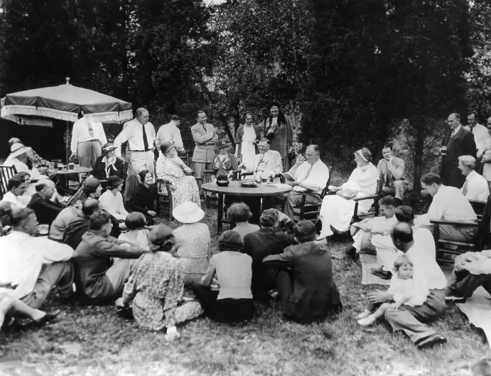 Framed Print : President Franklin Roosevelt hosts a picnic for their friends and neighbors at Val-Kil Cottage. FDR entertains the group with a reading Framed Print : President Franklin Roosevelt hosts a picnic for their friends and neighbors at Val-Kil Cottage. FDR entertains the group with a reading