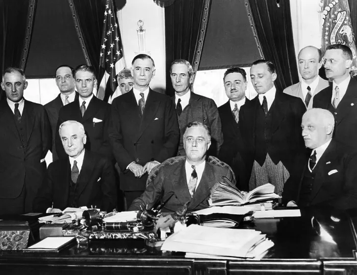 Framed Print : President Franklin Roosevelt with preparing for the 1933 World Economic Conference. Seated, L-R: Cordell Hull, Secy. Of State; FDR; Guido Jung, Italian Minister of Finance