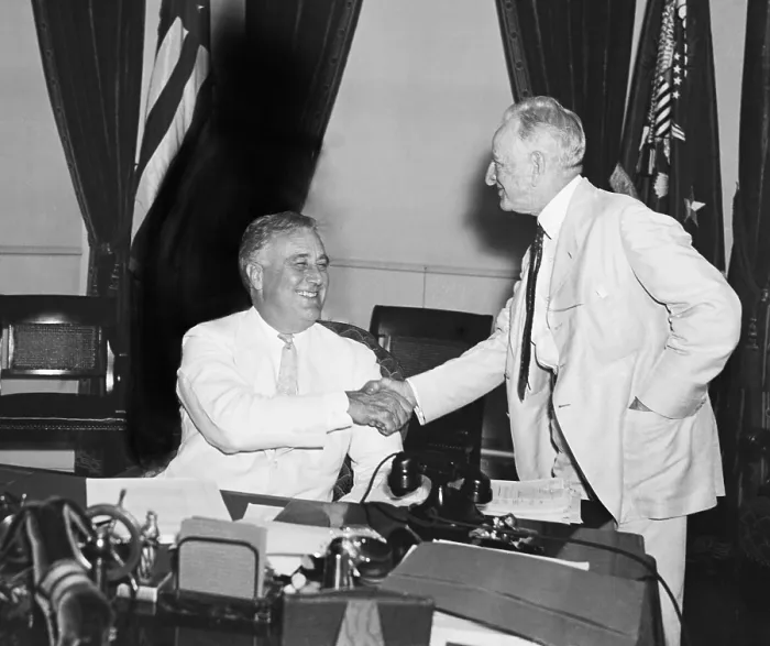 Framed Print : President Franklin Roosevelt shakes hands with Sen. Carter Glass. In 1933 Glass sponsored the Glass-Steagall Act, which separated the activities of banks and securities brokers
