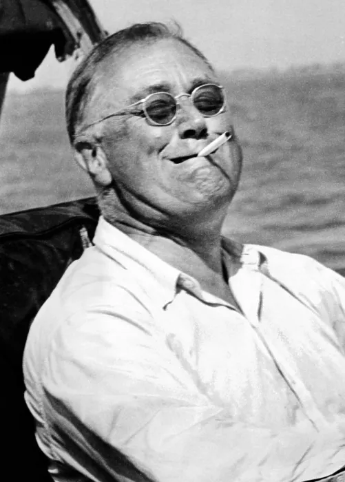 Framed Print : President Franklin Roosevelt smokes a cigarette while fishing for tarpon during his vacation on the Gulf of Mexico. May 10, 1937. (CSU_ALPHA_141) CSU Archives / Everett Collection