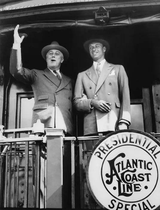 Framed Print : President Franklin Roosevelt with son James, waving from the Presidential Special. Dec. 31, 1934. (BSLOC_2013_5_111) Framed Print : President Franklin Roosevelt with son James, waving from the Presidential Special. Dec. 31, 1934. (BSLOC_2013_5_111)