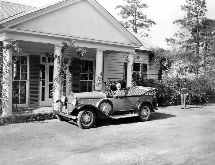 Framed Print : President Franklin Roosevelt in his specialized car at his vacation cottage at Warm Springs, Georgia where he spent the Thanksgiving holiday. Nov. 23, 1935 Framed Print : President Franklin Roosevelt in his specialized car at his vacation cottage at Warm Springs, Georgia where he spent the Thanksgiving holiday. Nov. 23, 1935