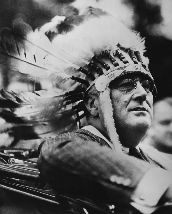 Framed Print : President Franklin Roosevelt wears a Native American war bonnet. Aug. 23, 1933. He was inducted into the National Scout Order of the Arrow at the Ten Mile River Camp, N.Y Framed Print : President Franklin Roosevelt wears a Native American war bonnet. Aug. 23, 1933. He was inducted into the National Scout Order of the Arrow at the Ten Mile River Camp, N.Y