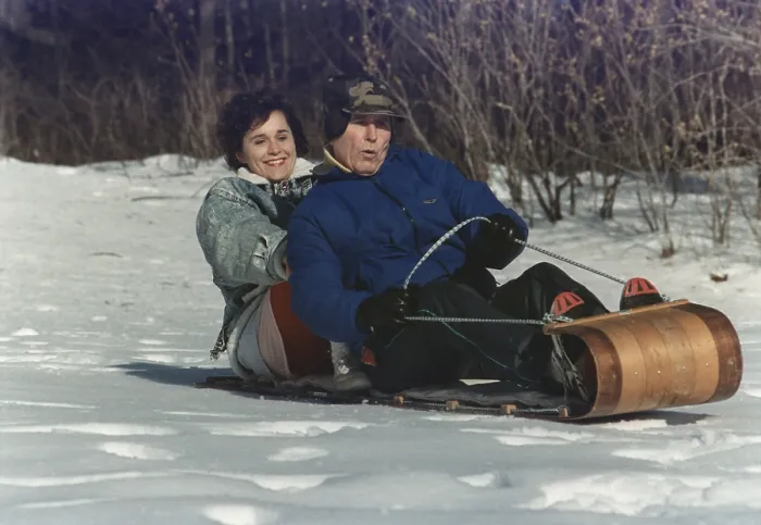 Framed Print : President George Bush goes sledding at Camp David with his daughter Doro. Jan. 13 1991. (BSLOC_2011_3_67) Framed Print : President George Bush goes sledding at Camp David with his daughter Doro. Jan. 13 1991. (BSLOC_2011_3_67)