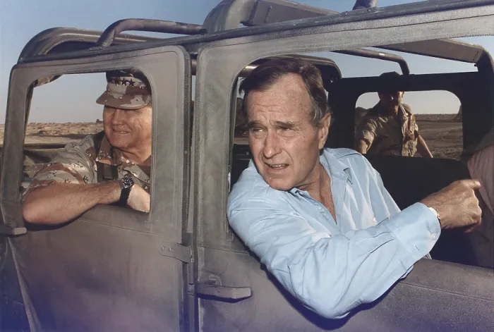 Framed Print : President George Bush riding in an armored jeep with General Schwarzkopf in Saudi Arabia. Nov. 22 1990. (BSLOC_2011_3_82)