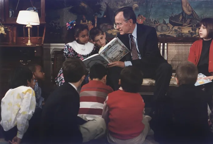 Framed Print : President George H. W. Bush reads A CHILD'S GARDEN OF VERSES to children on the first Great American Read Aloud Day April 19 1991. (BSLOC_2011_3_65)