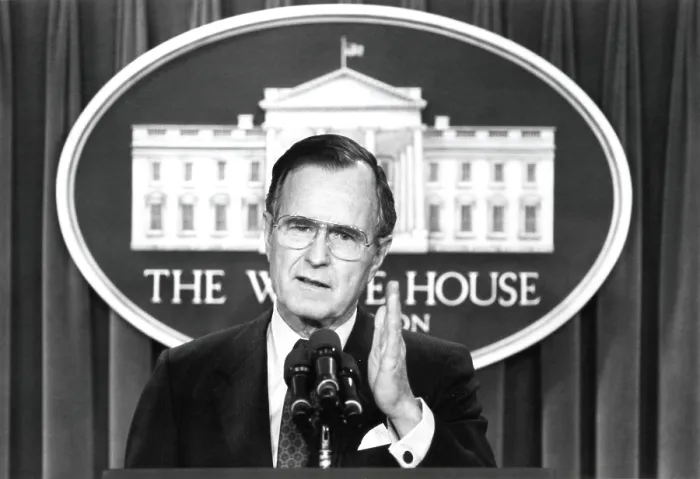 Framed Print : President George H.W. Bush answering a reporters question on Jan. 27, 1989, during his first post-election press conference (BSLOC_2021_3_50)