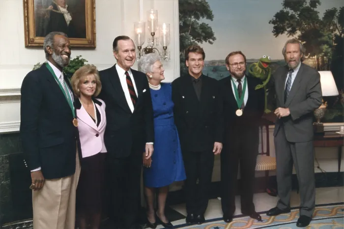 Framed Print : President George H.W. Bush and Barbara Bush, with notable Americans: Wally Amoss, Barbara Mandrell, Patrick Swayze, Ed Castor, Jim Hanson and Kermit the Frog. Feb Framed Print : President George H.W. Bush and Barbara Bush, with notable Americans: Wally Amoss, Barbara Mandrell, Patrick Swayze, Ed Castor, Jim Hanson and Kermit the Frog. Feb