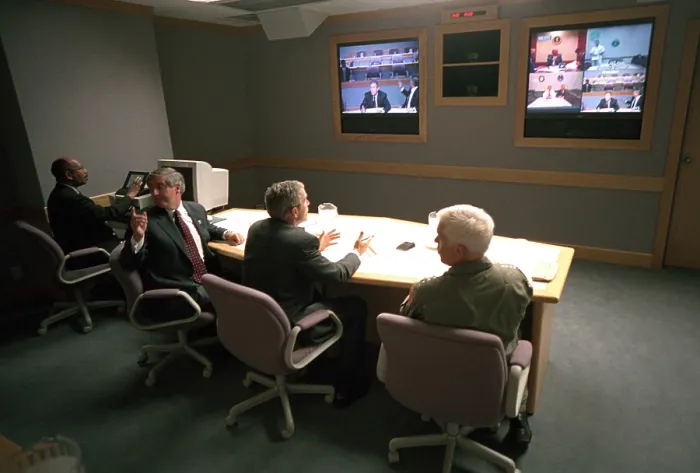 Framed Print : President George W. Bush in a multiscreen video conference at Offutt Air Force Base, Sept. 11, 2001. He met with the National Security Council in a teleconference via the U.S