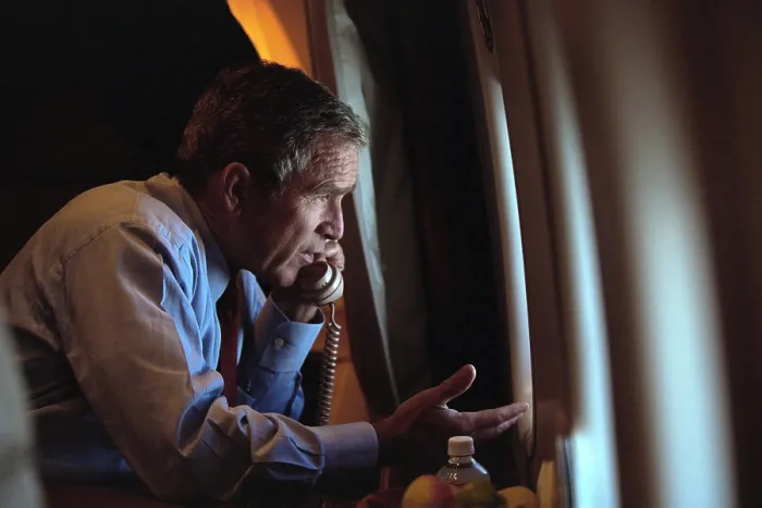 Framed Print : President George W. Bush on the phone with Vice President Dick Cheney from Air Force One. Sept. 11, 2001