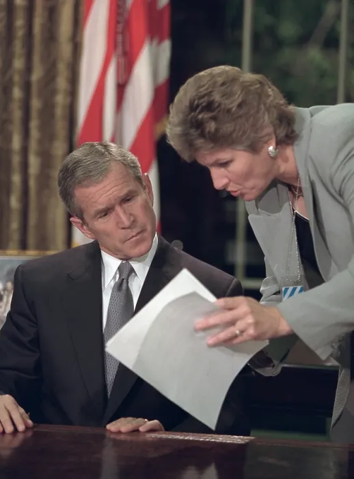 Framed Print : President George W. Bush reviews notes with Karen Hughes before speaking from the Oval Office