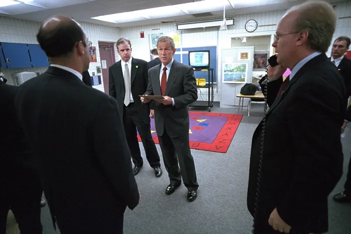 Framed Print : President George W. Bush with senior staff after learning of the 9-11 Terrorist Attacks. He is still at Emma E. Booker Elementary School in Sarasota, FL