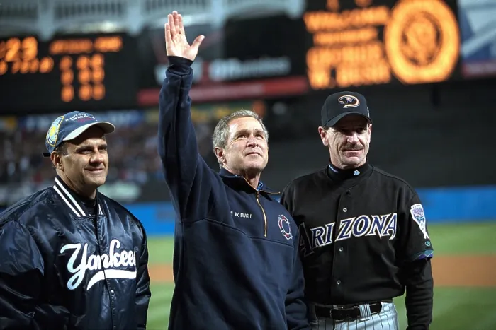 Framed Print : President George W. Bush waves to the World Series crowd at Yankee Stadium. With him are Yankees manager Joe Torre (left) and Diamondbacks manager Bob Brenly. Oct. 30, 2001 Framed Print : President George W. Bush waves to the World Series crowd at Yankee Stadium. With him are Yankees manager Joe Torre (left) and Diamondbacks manager Bob Brenly. Oct. 30, 2001