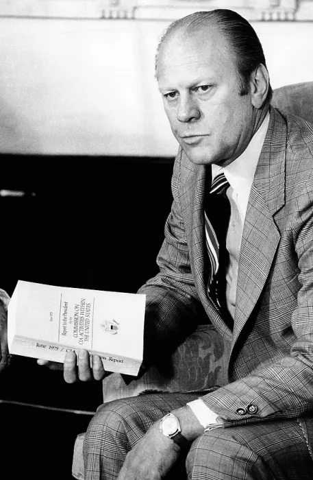 Framed Print : President Gerald Ford holds the Official Report of the Rockefeller Commission's investigation of the CIA Framed Print : President Gerald Ford holds the Official Report of the Rockefeller Commission's investigation of the CIA