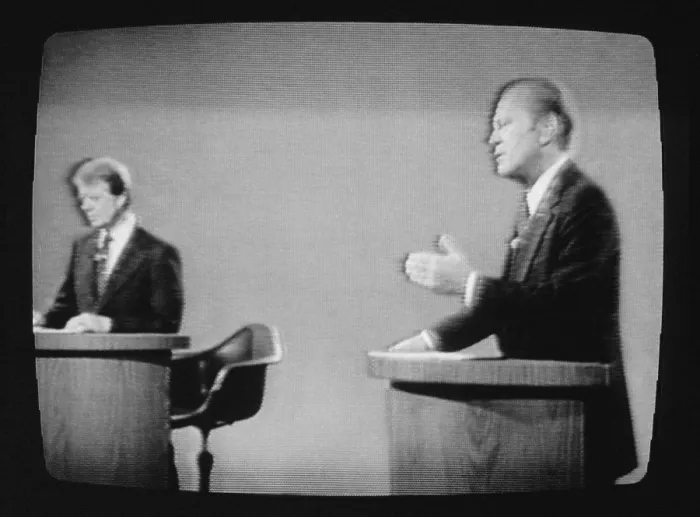 Framed Print : President Gerald Ford and Jimmy Carter on television during their first presidential debate. Polls taken after the debate showed that most viewers felt that Ford was the winner Framed Print : President Gerald Ford and Jimmy Carter on television during their first presidential debate. Polls taken after the debate showed that most viewers felt that Ford was the winner