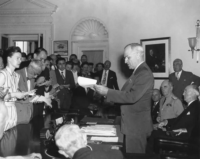 Framed Print : President Harry Truman announcing Japan's surrender to reporters in the Oval Office. Seated behind President Truman are John Snyder, Treasury Sec.; Adm Framed Print : President Harry Truman announcing Japan's surrender to reporters in the Oval Office. Seated behind President Truman are John Snyder, Treasury Sec.; Adm