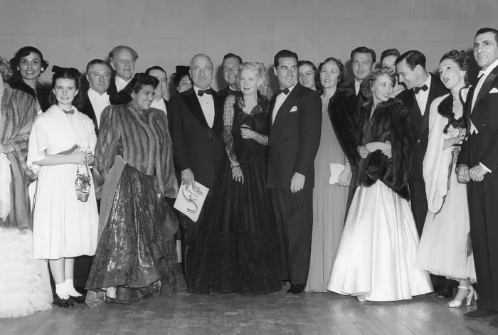 Framed Print : President Harry Truman poses with performers of the inaugural gala held at the National Guard Armory. Jan. 19, 1948