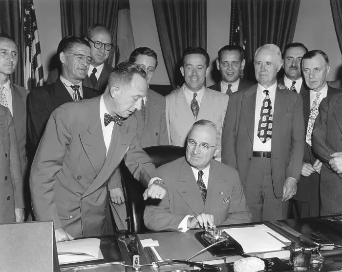 Framed Print : President Harry Truman about to push a button activating a new generator at Grand Coulee Dam. May 20, 1949. Members of Congress from a number of Western states look Framed Print : President Harry Truman about to push a button activating a new generator at Grand Coulee Dam. May 20, 1949. Members of Congress from a number of Western states look
