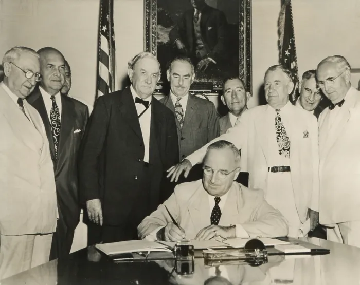 Framed Print : President Harry Truman signs the Atlantic Pact on July 27, 1949. Behind Truman, Standing, L-R: Sen. Walter George; Def. Sec. Louis Johnson; Sen. Tom Connally; Sec