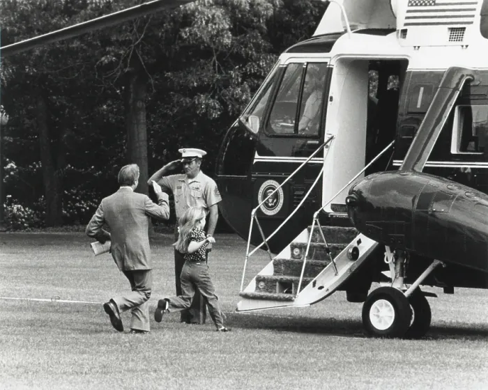 Framed Print : President Jimmy Carter and 8 year old daughter Amy running to Marine One. May 13, 1977. (BSLOC_2015_14_71) Framed Print : President Jimmy Carter and 8 year old daughter Amy running to Marine One. May 13, 1977. (BSLOC_2015_14_71)