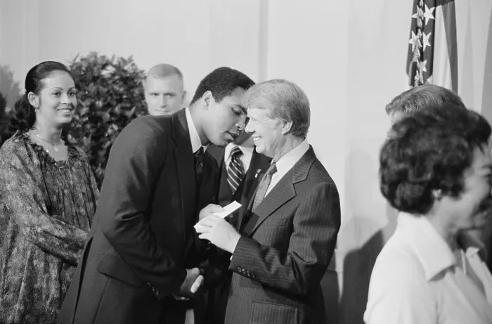 Framed Print : President Jimmy Carter greets Muhammad Ali at a White House dinner celebrating the signing of the Panama Canal Treaty. Sept. 7 1978
