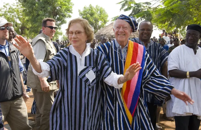 Framed Print : Former President Jimmy Carter and Rosalynn Carter wear traditional clothing in Tingoli, in northern Ghana Framed Print : Former President Jimmy Carter and Rosalynn Carter wear traditional clothing in Tingoli, in northern Ghana