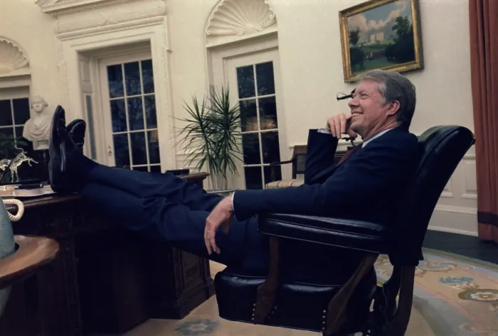 Framed Print : President Jimmy Carter sitting with his feet on the desk and smiling after Senate ratification of the Panama Canal Treaties. March-April 1978 Framed Print : President Jimmy Carter sitting with his feet on the desk and smiling after Senate ratification of the Panama Canal Treaties. March-April 1978