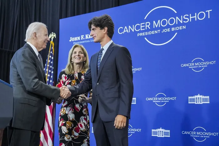 Framed Print : President Joe Biden greets Ambassador Caroline Kennedy and her son John Jack Schlossberg after delivering his Cancer Moonshot speech, Sept