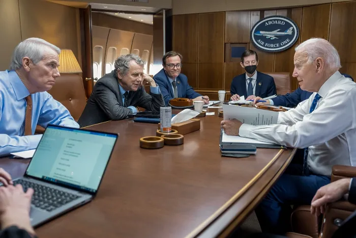 Framed Print : President Joe Biden meets with his traveling guests Ohio Senators, Republican Rob Portman (left), and Democrat Sherrod Brown (center) aboard Air Force One, Jan. 4, 2023