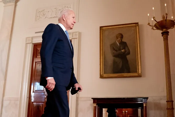 Framed Print : President Joe Biden passes by Aaron Shiklers painting of John F