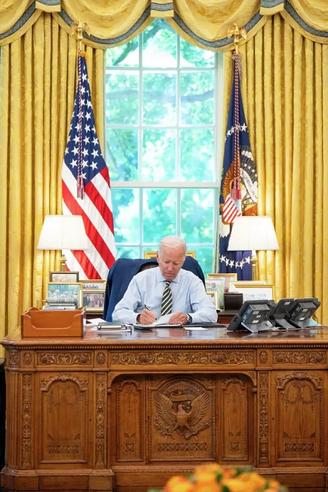 Framed Print : President Joe Biden seated in the White House Oval office at the Resolute desk, Aug. 31, 2023. (BSLOC_2023_8_1)