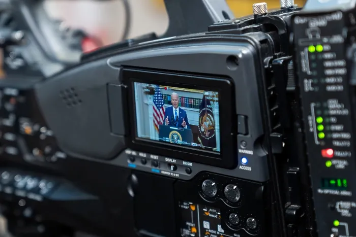 Framed Print : President Joe Biden is seen on small screen of a digital motion camera he announces his request to Congress for additional funding for arms