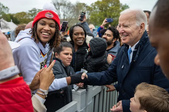 Framed Print : President Joe Biden shakes hands with a multiracial group of guests attending the White House Easter Egg Roll on the White House South Lawn, April 18, 2022. (BSLOC_2022_3_20) Framed Print : President Joe Biden shakes hands with a multiracial group of guests attending the White House Easter Egg Roll on the White House South Lawn, April 18, 2022. (BSLOC_2022_3_20)