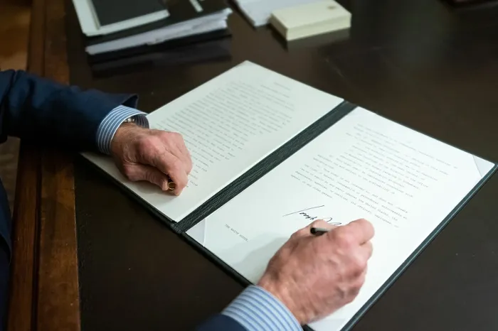 Framed Print : President Joe Biden signs an executive order promoting access to voting on March 6, 2021, the 56th anniversary of Bloody Sunday in Selma, Alabama (BSLOC_2021_8_6)