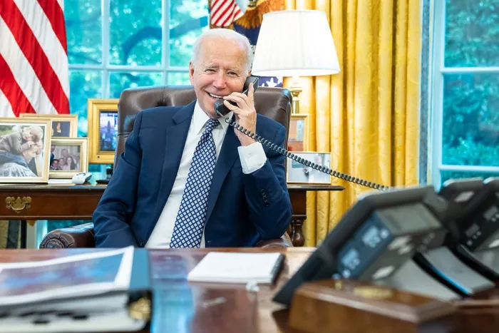 Framed Print : President Joe Biden talks on the phone with House Speaker Nancy Pelosi, Aug. 24, 2021