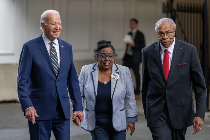 Framed Print : President Joe Biden walks with Amos Smith, Emmet Till's cousin, and Viola Fletcher, a witness to the 1921 Tulsa race riot, also called the Tulsa race massacre